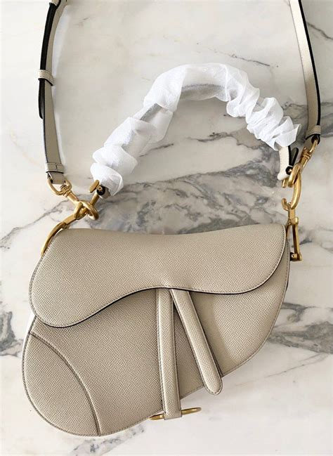 Handbag Guide: A Deep Dive Into the Dior Saddle Bag .